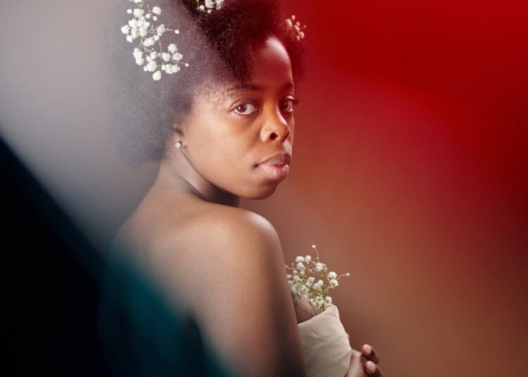 shoulder length half up mother of the bride hair